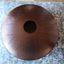 A N’goni Skipping Stone, 9 note steel tongue drum