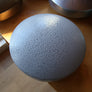 A N’goni Skipping Stone, 9 note steel tongue drum