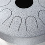 A N’goni Skipping Stone, 9 note steel tongue drum