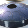 A N’goni Skipping Stone, 9 note steel tongue drum