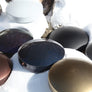 A N’goni Skipping Stone, 9 note steel tongue drum