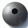 A N’goni Skipping Stone, 9 note steel tongue drum