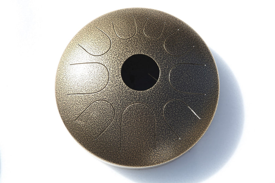 A N’goni Skipping Stone, 9 note steel tongue drum